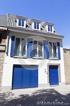 White and dark blue traditional house Stock Photo