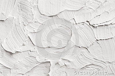 White decorative abstract plaster texture with textured smears. Stock Photo