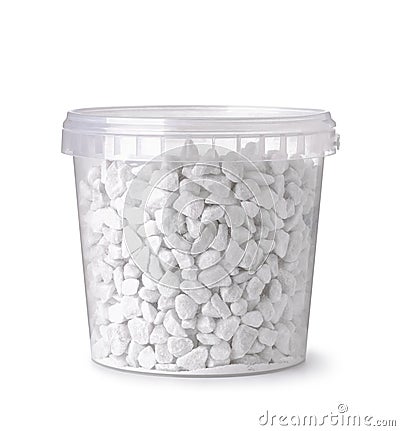 White decorative marble chips in plastic bucket Stock Photo