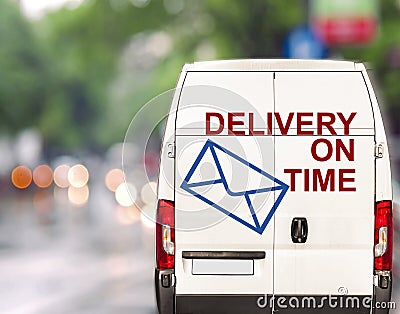 White delivery on time Van driving fast on city blurr bokeh Stock Photo