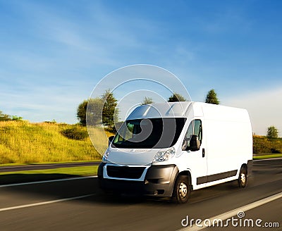White delivery van on highway Stock Photo