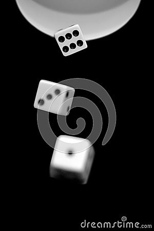 White dice i on black background. Stock Photo