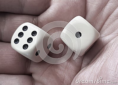 White dices in man hand Stock Photo