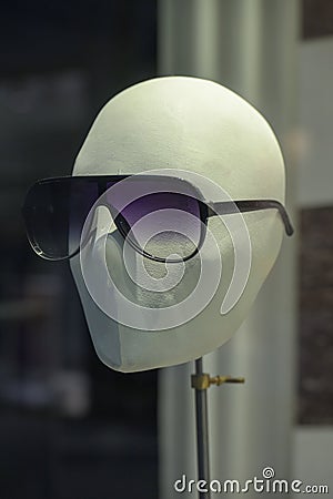 White display dummy mannequin head with sun glasses Stock Photo