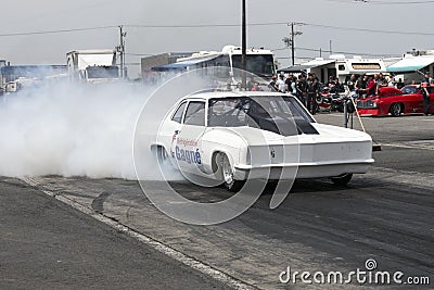 White drag car burnout Editorial Stock Photo