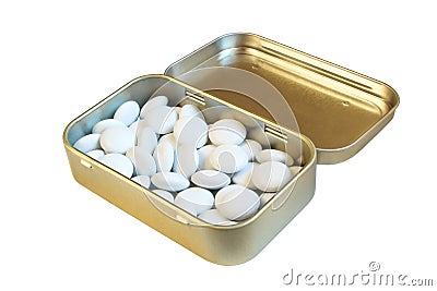 White dragees in elegant metal packaging. Shiny gold candy tin isolate on white background Stock Photo