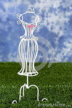 White dress form on grass Stock Photo