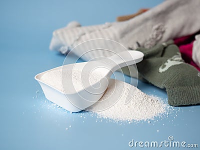 White dustpan with baby washing powder Stock Photo