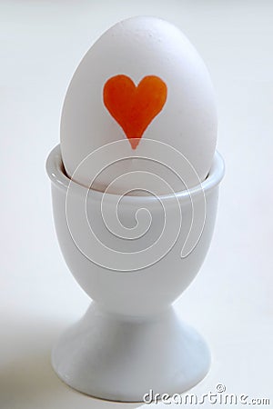 Egg with a red heart Stock Photo