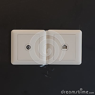 white electric plugs or outlet on wall during construction Stock Photo