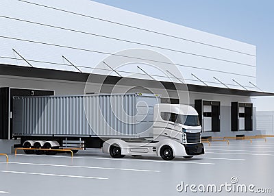 White electric truck parking in front of modern logistics center Stock Photo