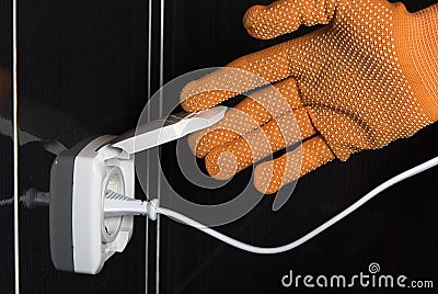 White electrical outlet socket with electricity safety cover in bathroom. Reducing safety hazard concept. Stock Photo