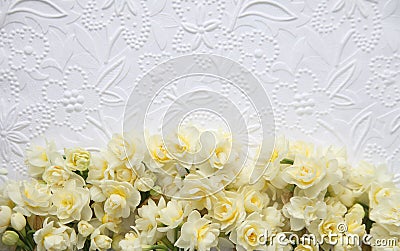 White embossed background with yellow flowers Stock Photo
