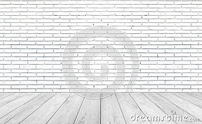 White empty wooden floors with brick wall background. Stock Photo