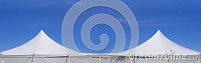 A white entertainment or party tent with two peaks Stock Photo