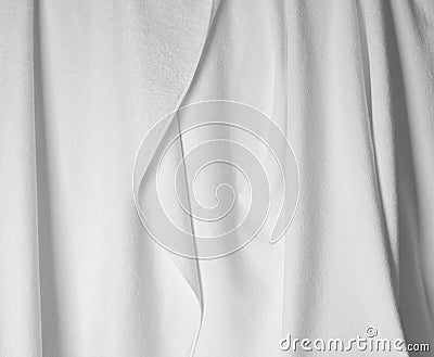 White fabric with folds close up photo Stock Photo