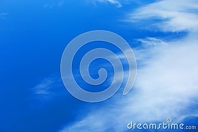 White feather clouds in a blue sky Stock Photo