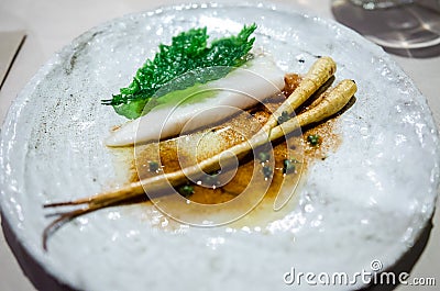 White fish with parsnip root Stock Photo