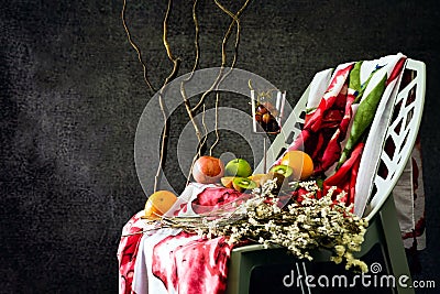 White flowers and purple flowers placed on the fabric. with Fabric, red flowers that lie on the chair. Photo background flowers, Stock Photo