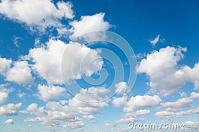 White, fluffy clouds in blue sky. Stock Photo