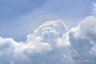 White fluffy clouds in the blue sky Stock Photo