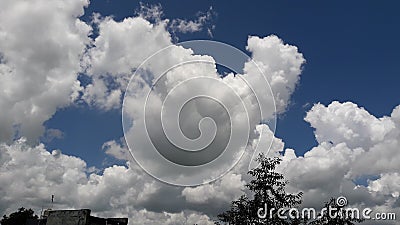 White fluffy clouds and blue sky Stock Photo