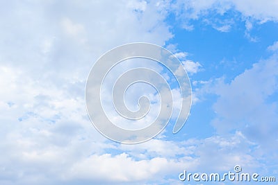 white fluffy clouds in a blue sky. background. Stock Photo