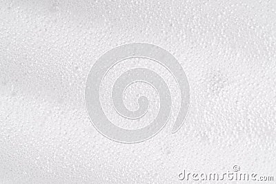 White foamy cleansing skin care product texture from soap, detergent, shampoo, shaving foam or cleanser. Soapy surface Stock Photo