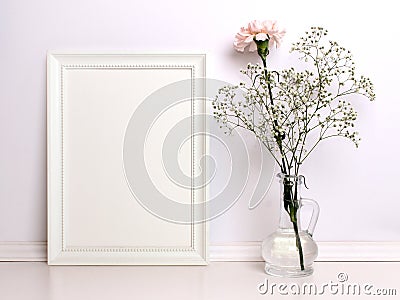 White frame mockup with flowers. Stock Photo