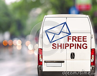 White free shipping Van driving fast on city blurr bokeh street Stock Photo