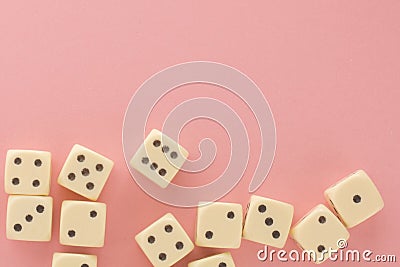 White gaming dices on pink background. victory chance and lucky. Flat lay style, place for text. Top view and Close-up cube. Stock Photo