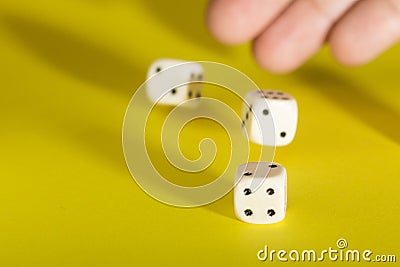 White gaming dices on yellow background. Victory chance and lucky. Place for text. Top view and Close-up cube. Concept business, Stock Photo