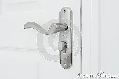 White gate with a lock Stock Photo