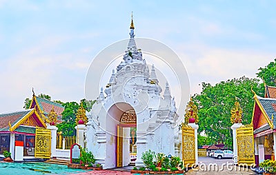 The white gate of Wat Phra That Hariphunchai Temple, Lamphun, Thailand Editorial Stock Photo