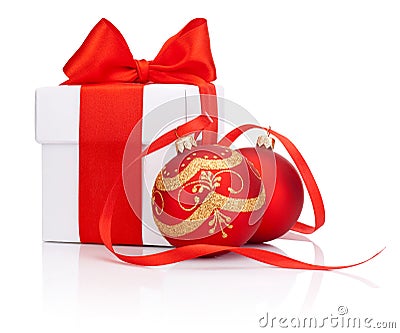 White gift box tied with Red ribbon and two Christmas ball Isolated Stock Photo