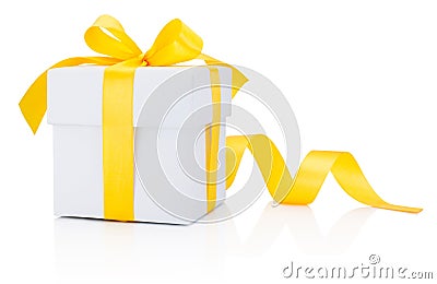 White gift box tied yellow ribbon bow Isolated on white background Stock Photo