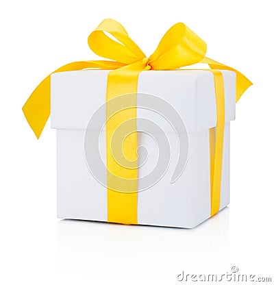 White gift box tied yellow ribbon Isolated on white background Stock Photo