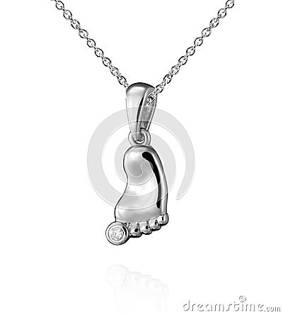 White gold child foot pendant with diamond isolated on white Stock Photo