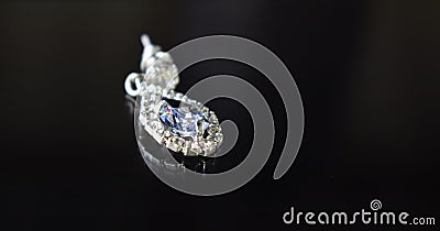 White gold earrings with diamonds It is an expensive luxury jewelry. Stock Photo
