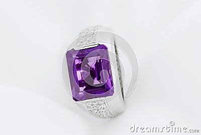 White Gold Ring With Amethyst And Diamonds On Soft White Stock Photo