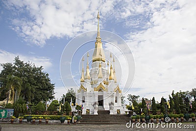 White and golden chedi of Wat Tham Khuha Sawan Temple Stock Photo