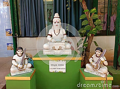 White granite sculptures of Maharshi Valmiki and his disciples, Lava and Kusha, installed in Sukha Vana, Mysore Editorial Stock Photo