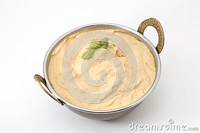 White gravy malai kofta in a copper brass bowl Stock Photo