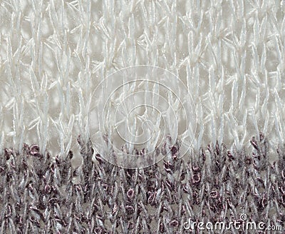 White and gray knit material - up close abstract background Stock Photo