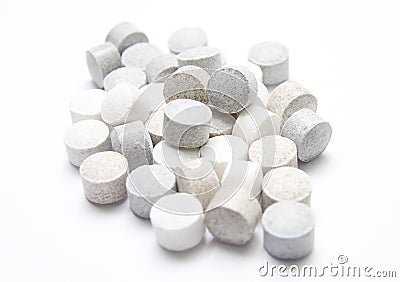 Pile of Speckled Tablets Stock Photo