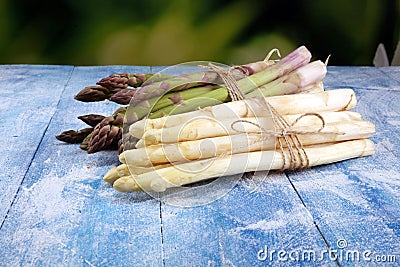 White and green asparagus on vintage old background Stock Photo