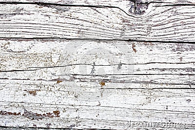 White and greyish painted cracked and peeling wooden wall board as texture background Stock Photo