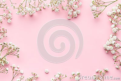 White gypsophila flowers or baby's breath flowers on pink background Stock Photo