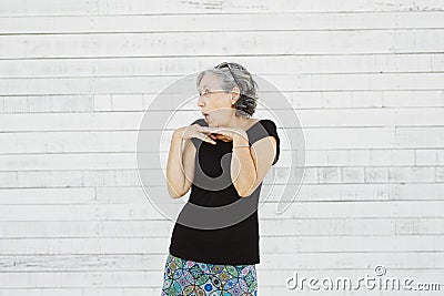 Senior woman making grimace Stock Photo