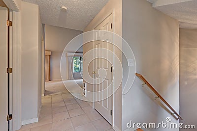 White hallway interior with tile floor Stock Photo